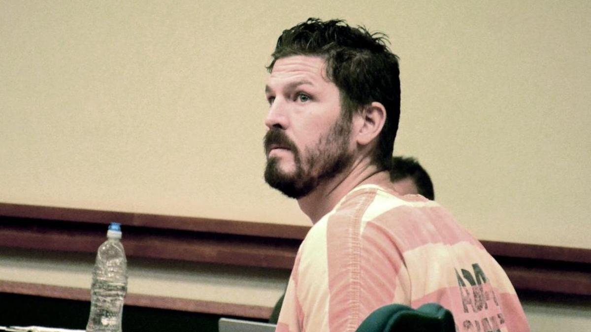 Jared Deveraux is seen here in court after being charged with dozens of counts of grand theft.