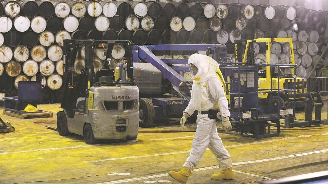 Workers at the Advanced Mixed Waste Treatment Project retrieve radioactive waste in this 2012 file photo. Now that waste retrieval is complete, officials are considering the future of the facility.