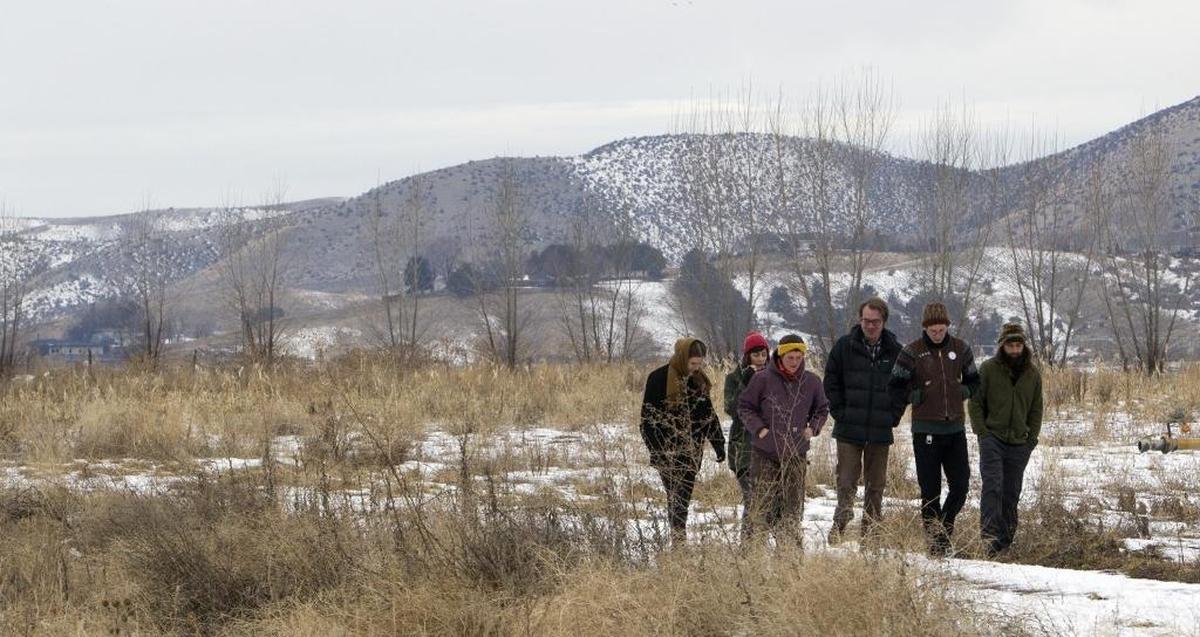Members of the Dry Creek Valley Coalition walk near the property boundary for Dry Creek Ranch, a planned community north of Boise between Hidden Springs and Idaho 55.