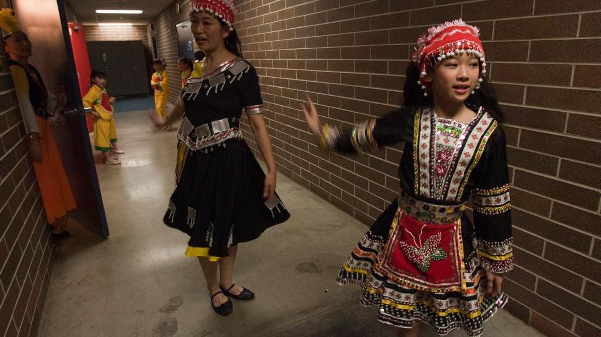 Hua Yan, left, and Megan Wang practice before a performance. Chinese dancers participated in a past Traditional Arts Apprenticeship program with support from the Idaho Commission on the Arts. The organization is welcoming applications for a variety of artistic grants and programs.