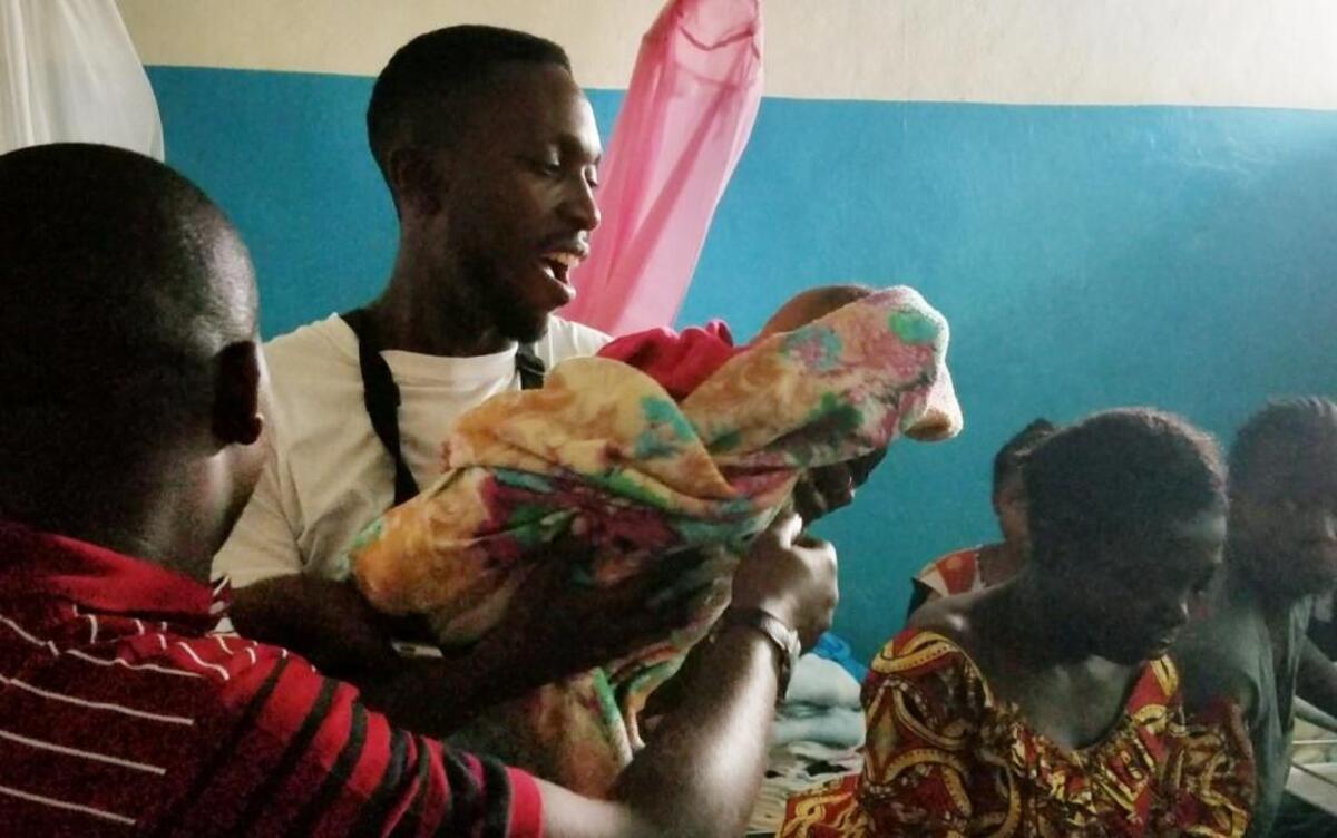 Fidel Nshombo spent days in the hospital in Bukavu, holding babies, talking with mothers, and negotiating with the hospital to pay as many bills as he could with donations from Boiseans.