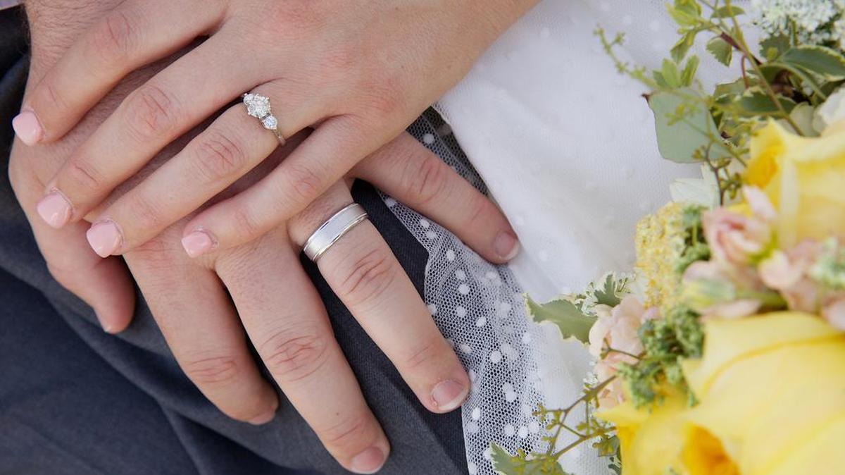 McGrath and Murphy posed with their rings after the ceremony in June 2014. Just 48 hours later Murphy’s ring would be at the bottom of Payette Lake.