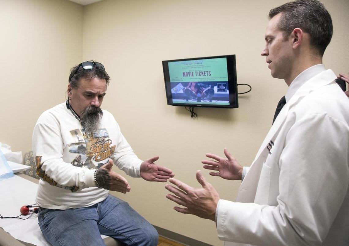 Jamie Harrell visits Dr. Darin Jurgensmeier at the Saint Alphonsus Joint Preservation and Reconstruction office in Boise. Jurgensmeier was one of the doctors who was called in to initially treat Harrell after he was struck by a car on Jan. 1, 2017.