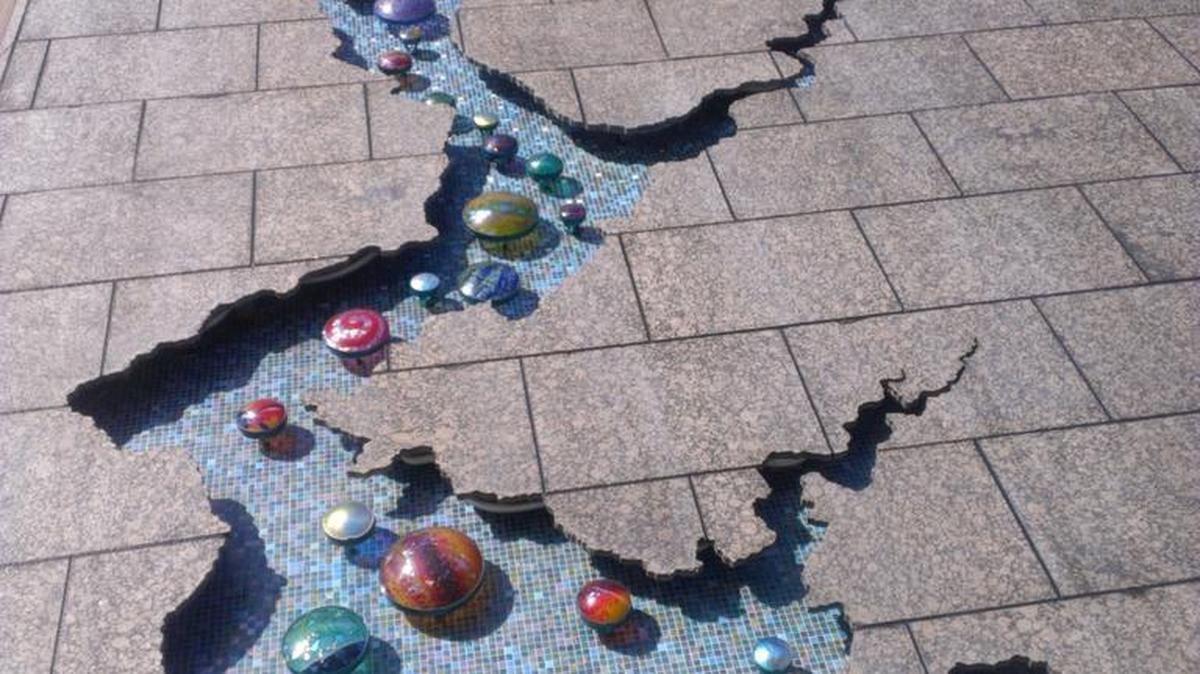 “River Sculpture” rehab. Mosaic tile has replaced the sculpture’s original painted background.