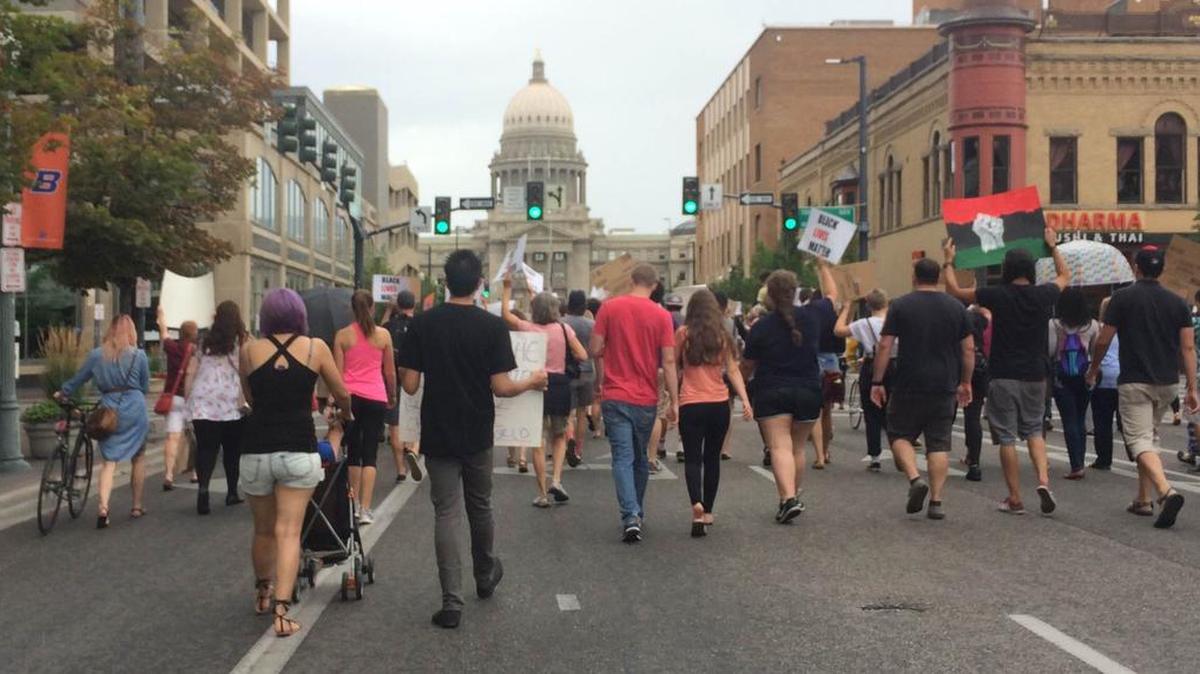 A crowd marches down Capitol Boulevard on Saturday, July 9, as part of a rally in support of the Black Lives Matter movement.