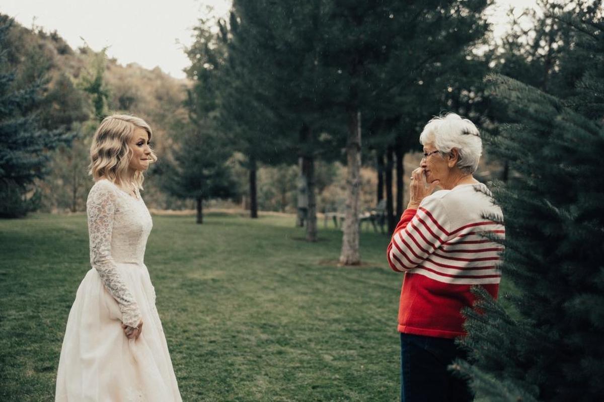 Boise’s Jordyn Cleverly, nee Jensen, surprised her grandmother, Penny Jensen, by wearing Penny’s 1962 wedding gown. The moment was captured in a first look photo session the night before the wedding.
