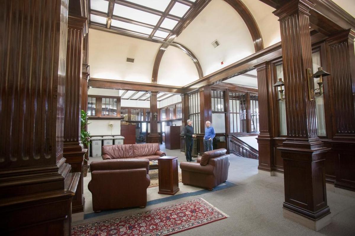 Boise developer Ken Howell, right, talks with Christopher Huntley, owner of Huntley Law Firm, which previously occupied the historic Carnegie Public Library building.