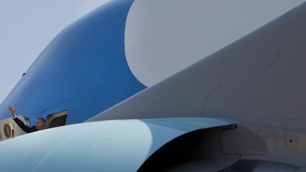President Barack Obama boards Air Force One at Andrews Air Force Base before traveling to Miami in April. The two 747-200B jumbo jets that often carry the Air Force One call sign are getting old, and so Obama is planning to have new presidential aircraft assembled for a successor.