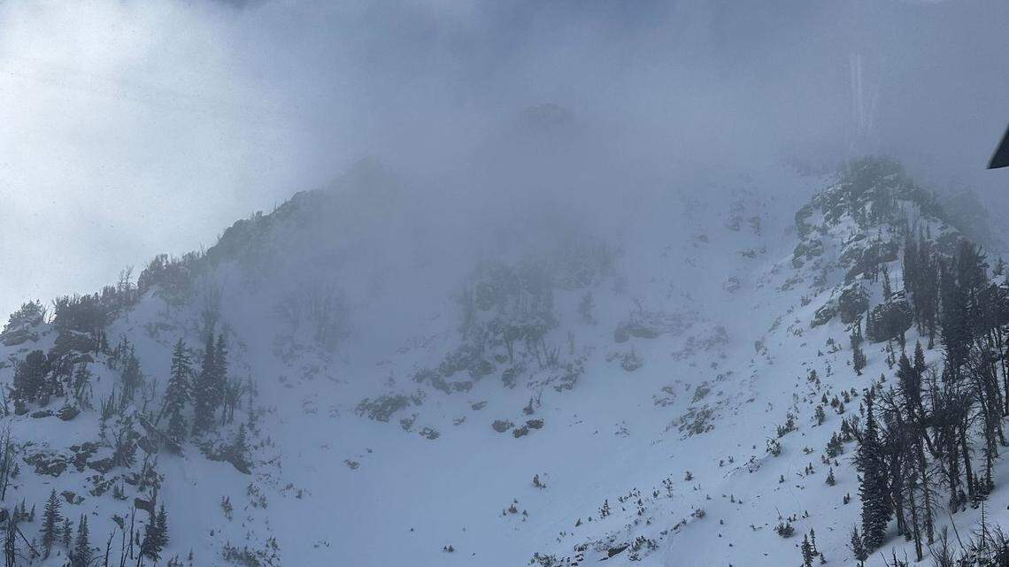 A skier was swept the length of more than four football fields down a steep gorge on a mountain in Grand Teton National Park.