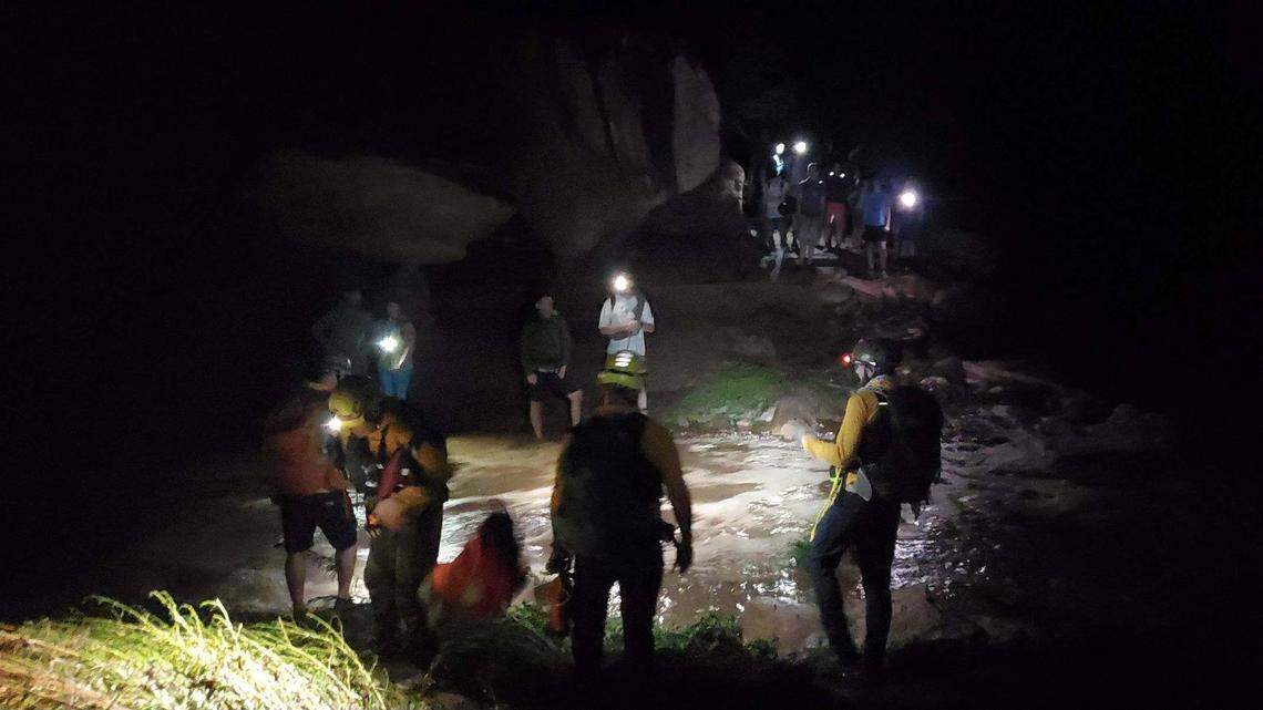 A severe thunderstorm caused flash flooding that stranded 20 people in a Utah canyon as darkness fell, rescuers said.