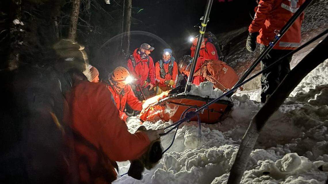 Rescuers hauled a skier injured in an avalanche through deep snow on a Colorado mountain.