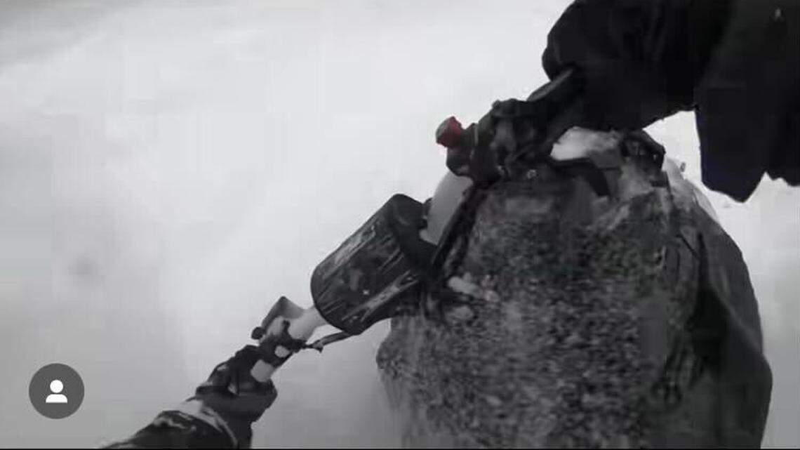 Chilling video shows a snowmobiler’s point-of-view as an avalanche buries him in Wyoming.