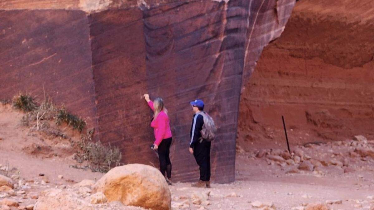 Tips from the public helped catch a pair of people who were photographed defacing an ancient petroglyph in Utah, cops say.