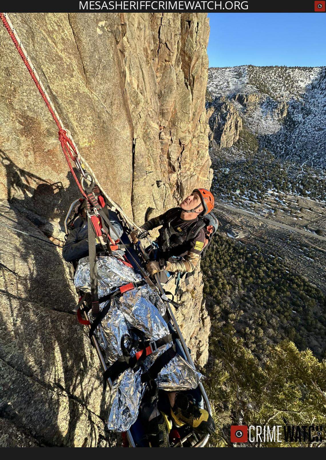 The rescue took place on a ledge about 200 feet from the cliff’s base.