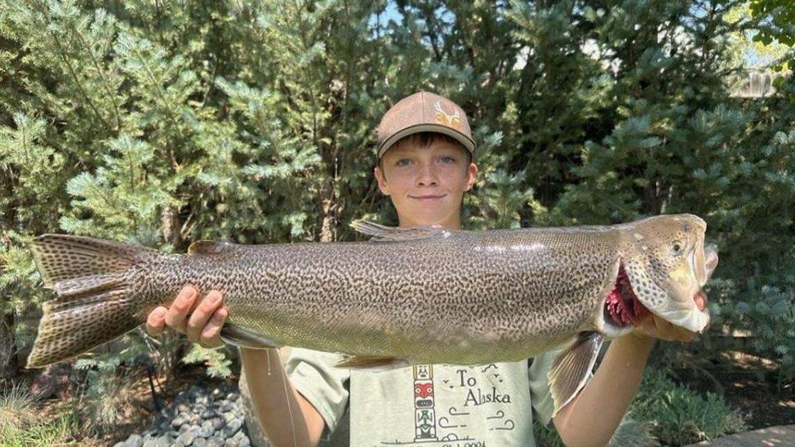 A young angler broke Wyoming’s state record for tiger trout.