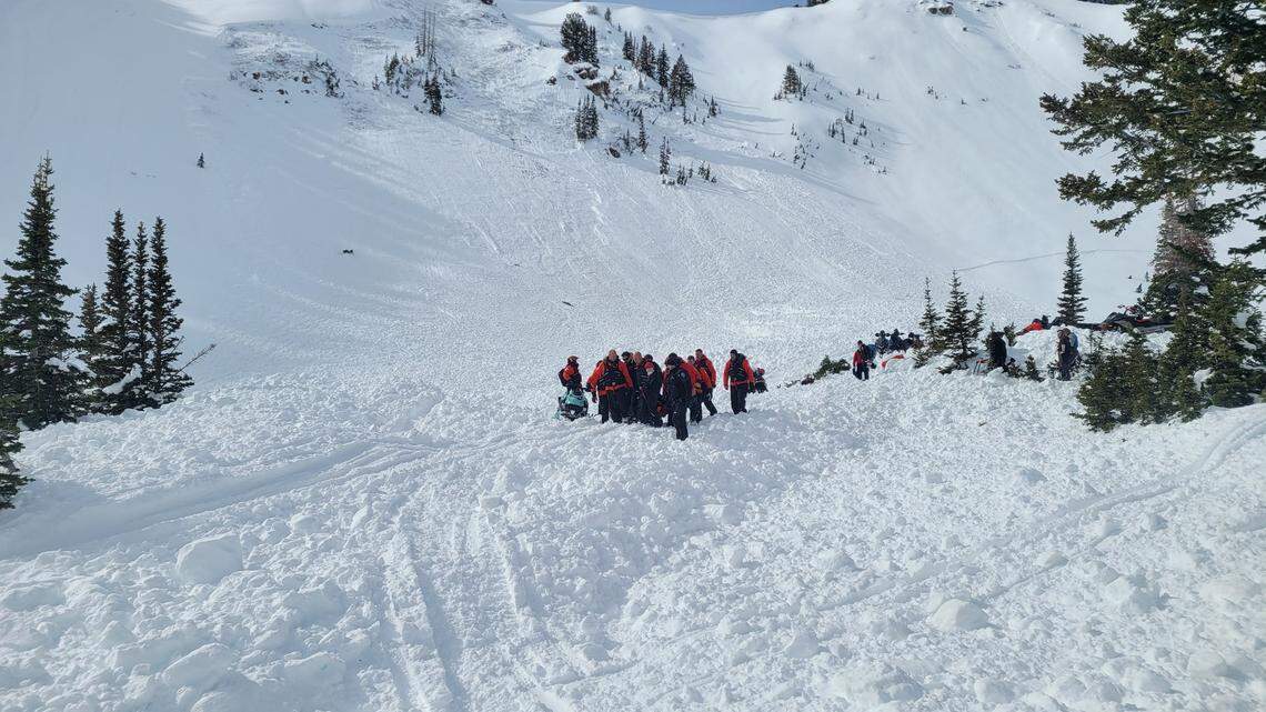 A pair of snowmobilers were injured in a massive avalanche on a Utah mountain, rescuers said.