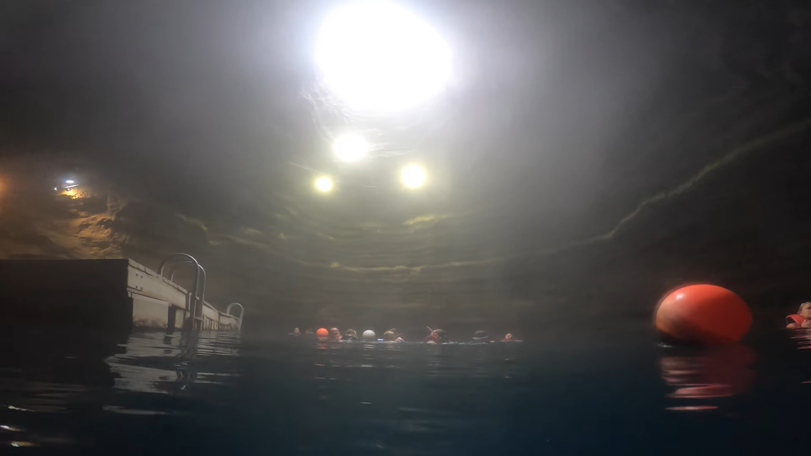 A diver died after surfacing from a popular hot springs crater in Utah, reports say.