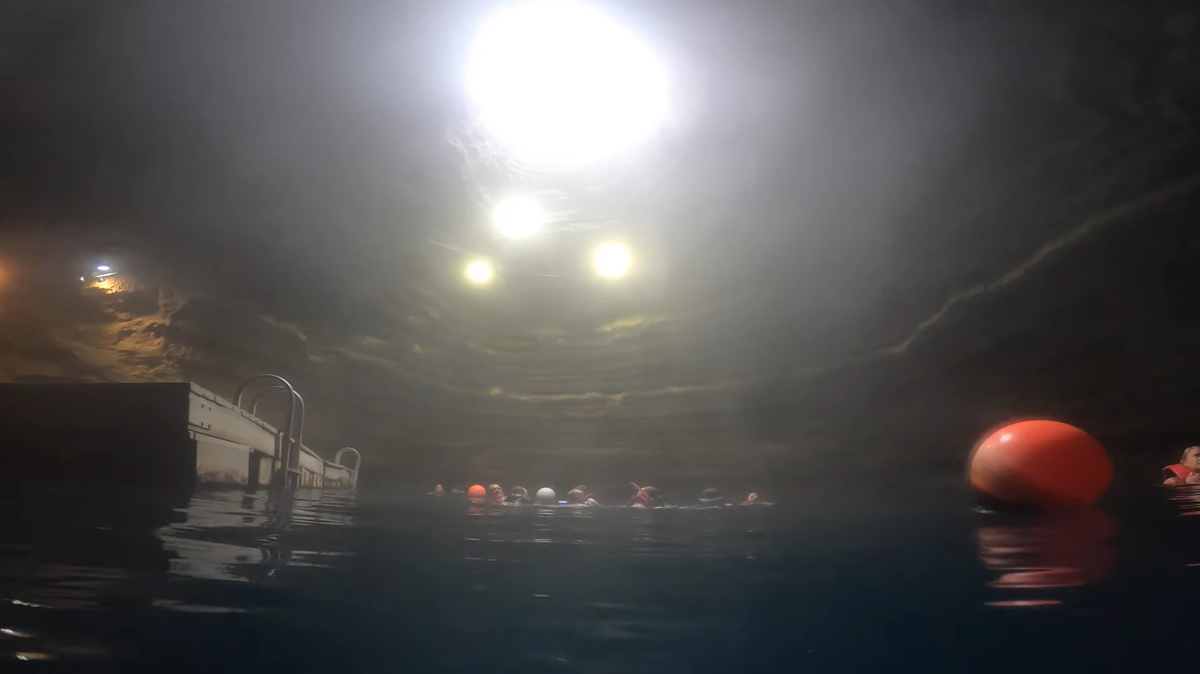 A diver died after surfacing from a popular hot springs crater in Utah, reports say.