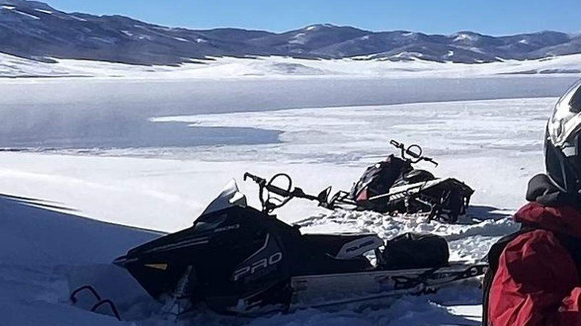 A pair of ice fishermen rode snowmobiles over a partially frozen Utah reservoir — and ended up falling through thin ice.