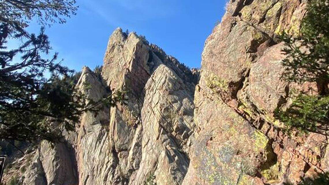 Two young climbers realized too late they were trapped on a steep rock wall as sunlight vanished in Colorado’s Eldorado Canyon State Park.