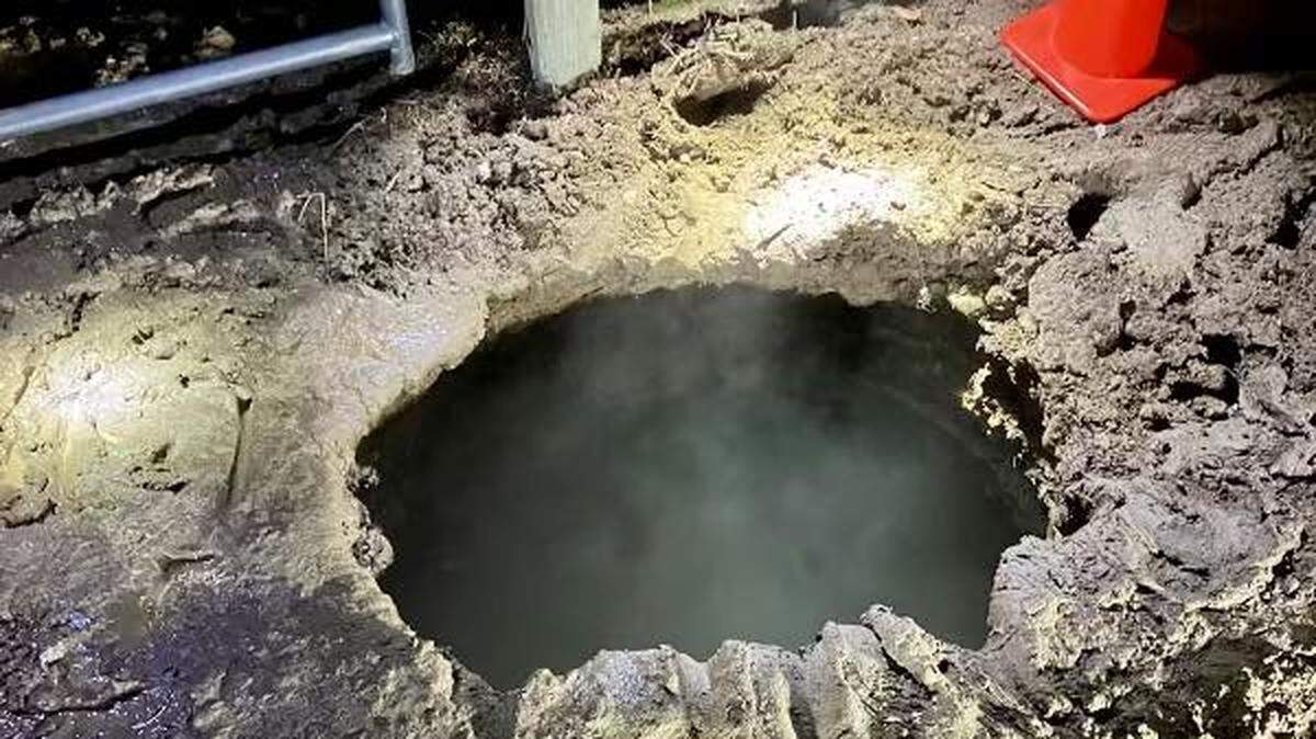 A sinkhole opened up right inside a horse pasture in Montana and swallowed one of the horses, dramatic photos show.