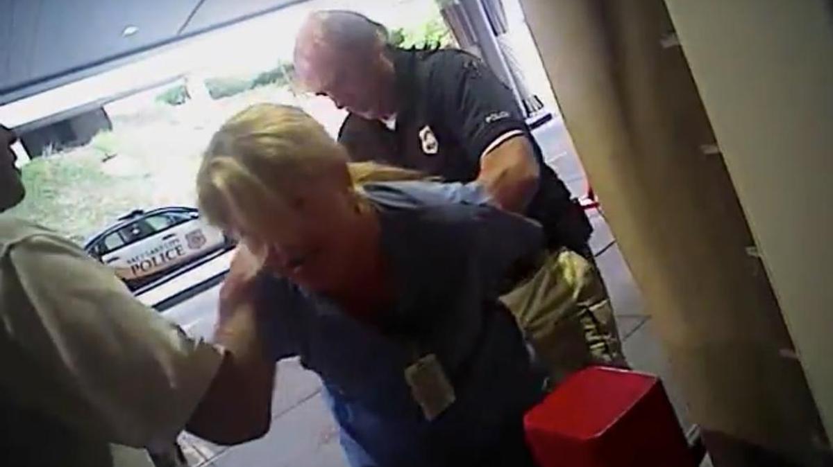 A Salt Lake City detective wanted to draw blood from a badly injured, unconscious patient. The nurse stood her ground and was dragged away.