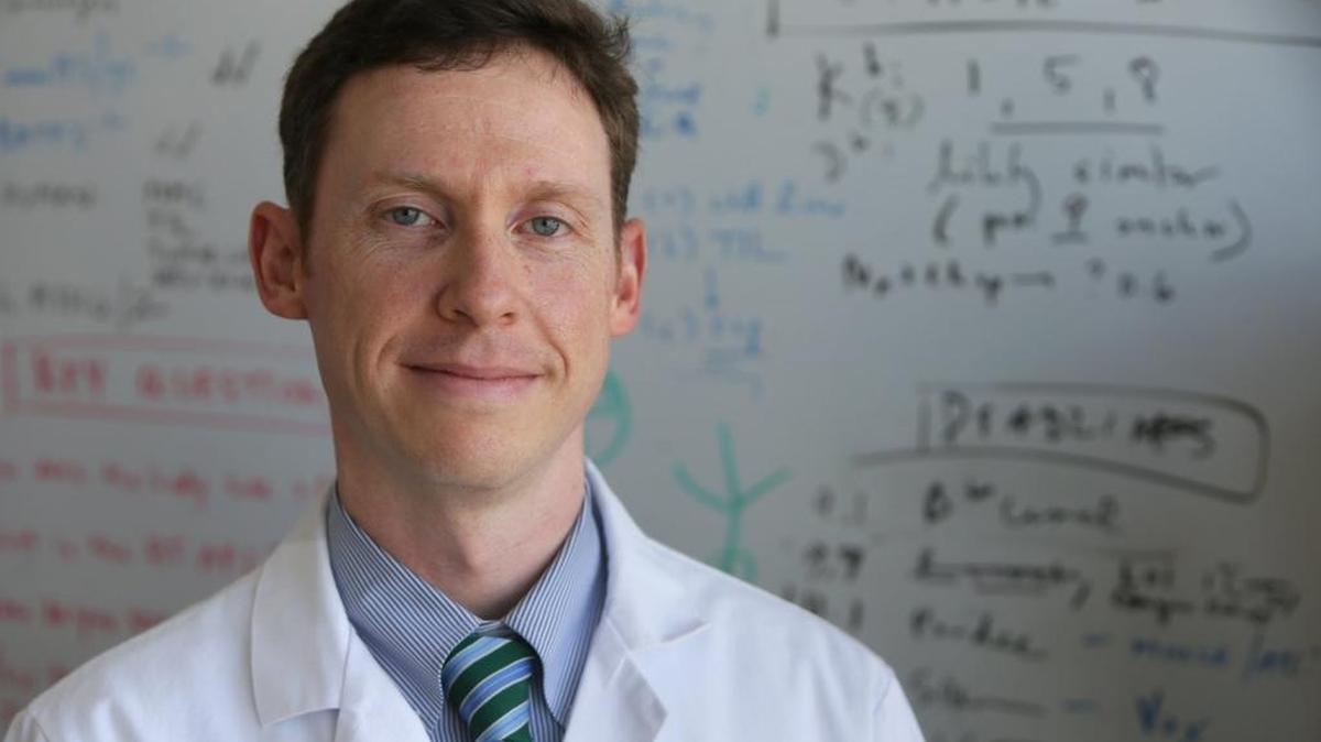 Dr. Gavin Dunn, a neurosurgeon, in his office at BJC Institute of Health at Washington University. Dunn is enrolling patients in a clinical trial to test a vaccine treatment for glioblastomas, or deadly brain tumors.