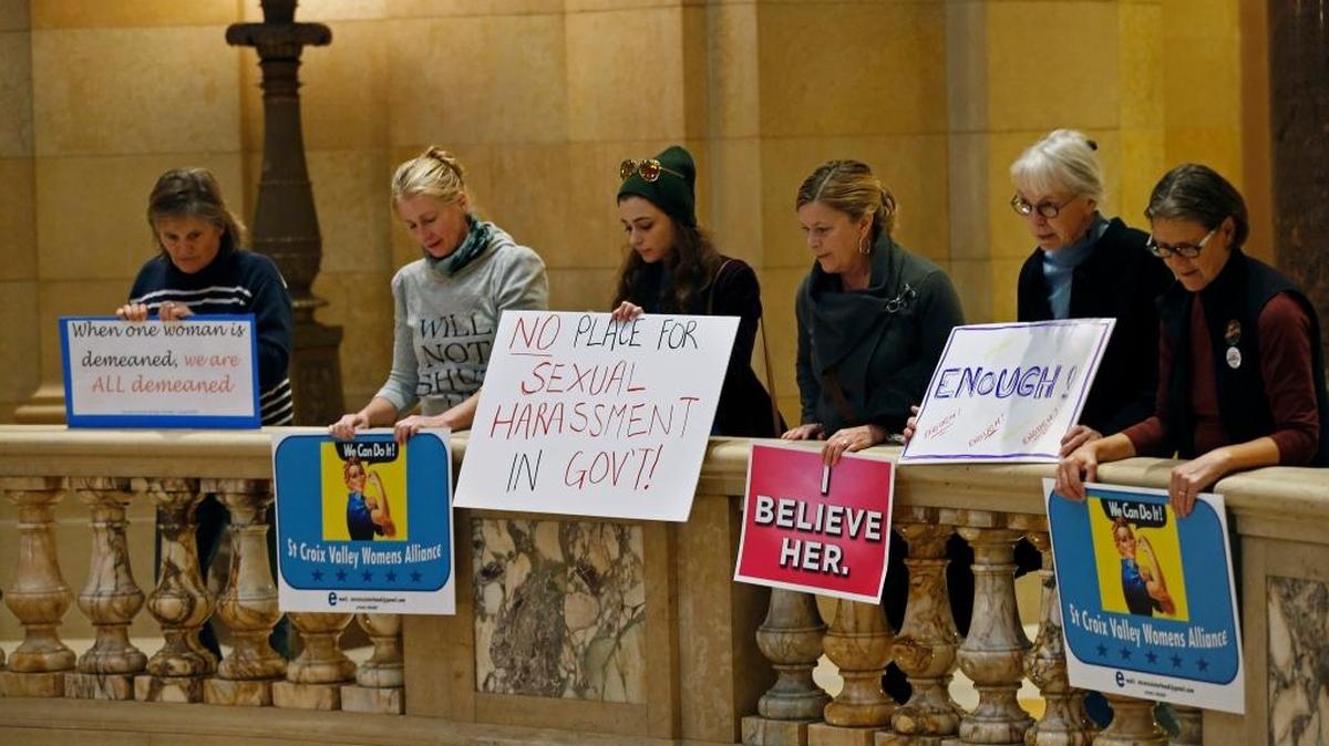Women rally Nov. 17 at the State Capitol in St. Paul, Minn., in response to a tide of sexual harassment allegations, including two sitting Minnesota lawmakers accused of making unwanted sexual advances and U.S. Sen. Al Franken, D-Minn, who allegedly forcibly kissed a woman during a USO tour in 2006 and was photographed reaching out as if to grope her while she slept on a military aircraft.