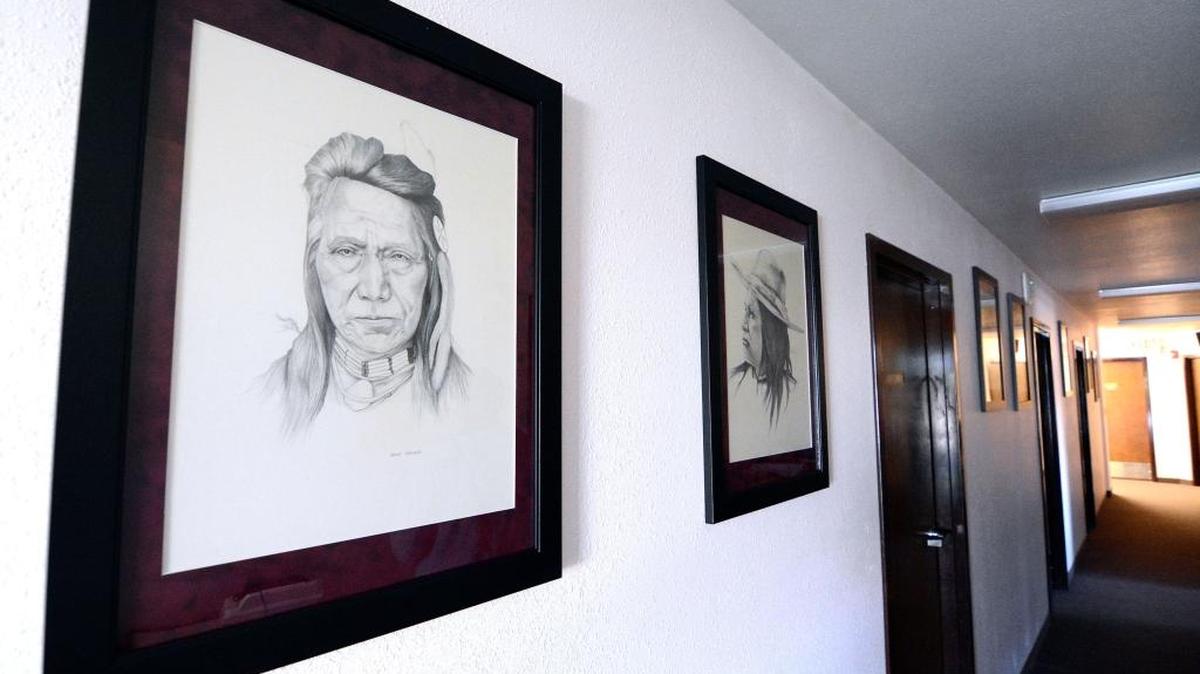 A group of pencil drawings of Nez Perce tribal leaders hangs in the hallway of the Nez Perce Tribal Executive Chambers on Aug. 25 in Lapwai,