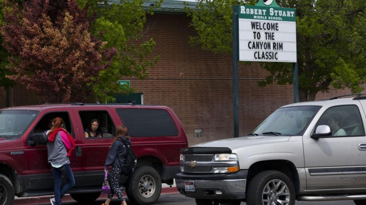 Parents pick up students at Robert Stuart Middle School in Twin Falls Friday, a few hours after a gun accidentally went off inside the school.
