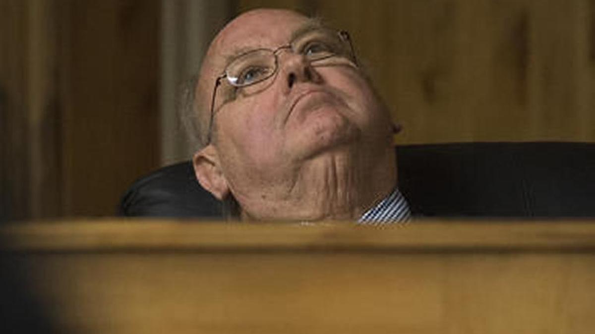District Judge Randy Stoker listens to John R.K. Howard's defense attorney Brad Calbo during Howard's sentencing hearing Friday.