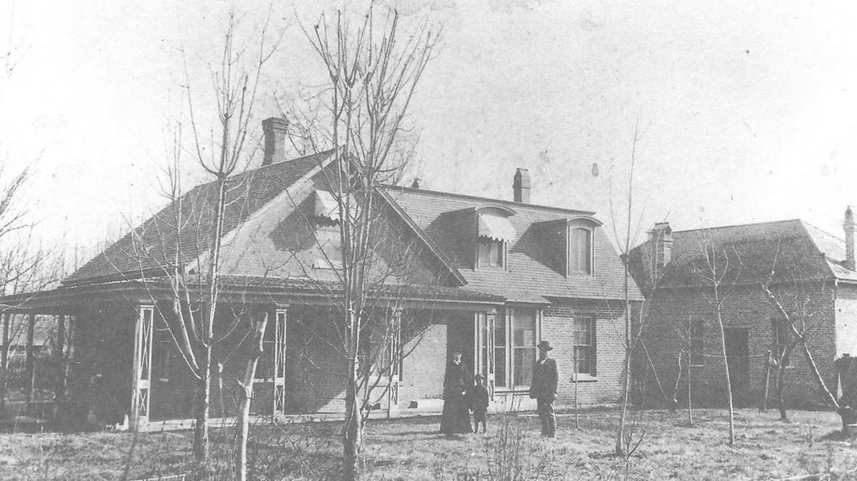 Cyrus and Mary Ellen Jacobs in front of their then-new Boise City house.