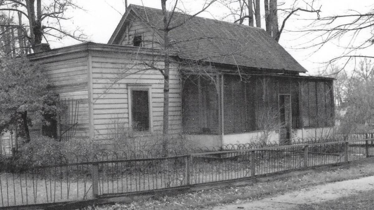 The Adelmann house on State Street before it was moved to Pioneer Village in Julia Davis Park.