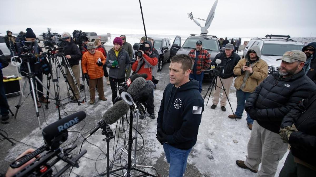 Brandon Curtiss talks to reporters after arriving at the Malheur National Wildlife Refuge near Burns, Ore, in January.