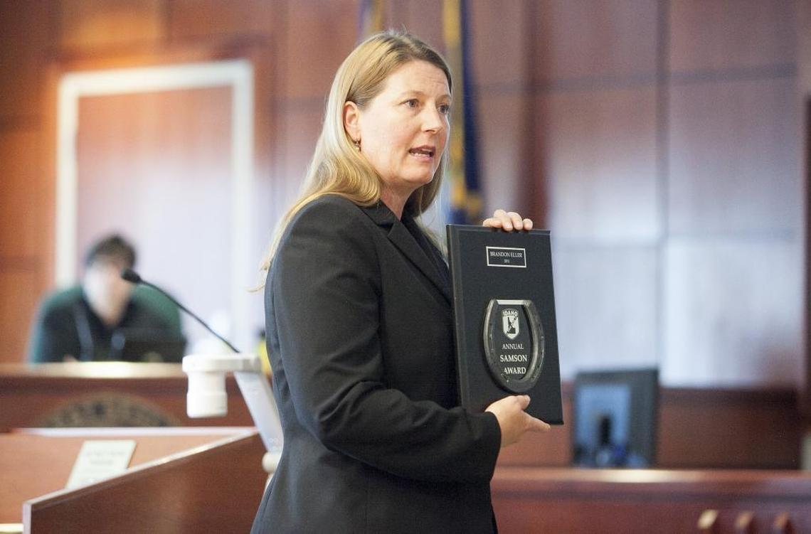 Attorney Erika Birch shows off an ISP annual Samson Award given in 2011 to her client, ISP whistleblower Brandon Eller. Eller claims the Idaho State Police retaliated against him after he raised concerns about the investigation of a fatal crash involving an Idaho sheriff’s deputy.