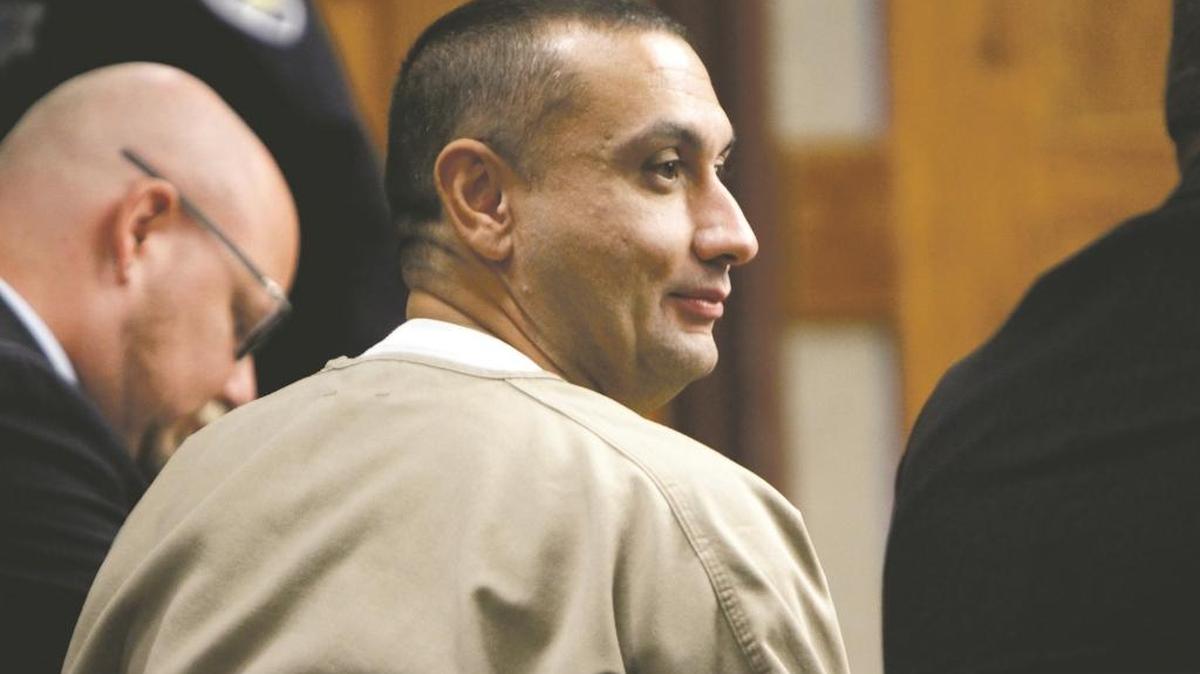 Chris Tapp talks to his lawyer before a Sept. 20 hearing at the Bonneville County Courthouse.