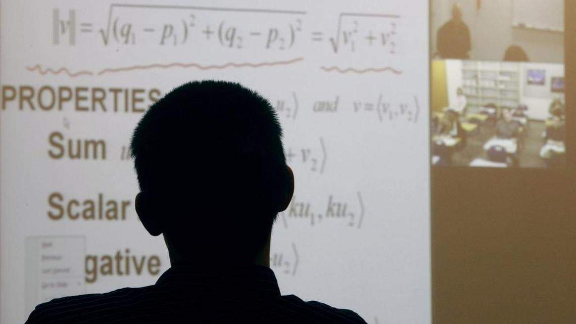 Rocky Mountain High junior Tyler Clark, 16, and two other students attend a Calculus II class taught remotely at Eagle High School via the then-new Idaho Education Network in November 2009.