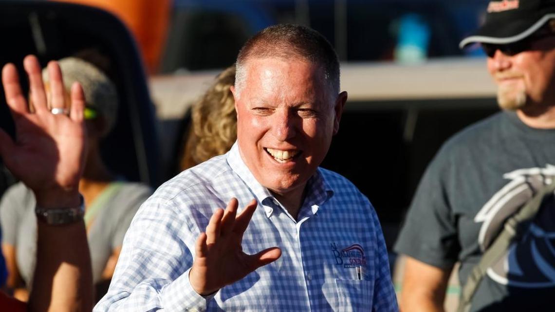 Idaho Democratic gubernatorial candidate A.J. Balukoff greets football fans in September 2014 before a college football game in Boise.
