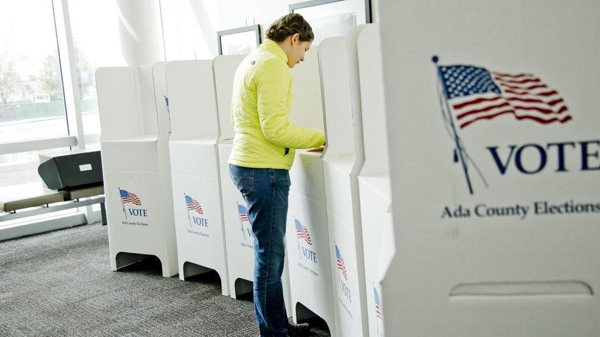 Voter Rebecca Lee casts her ballot in the Republican primary at Precinct 1710 at the Boise State Student Union building Tuesday.