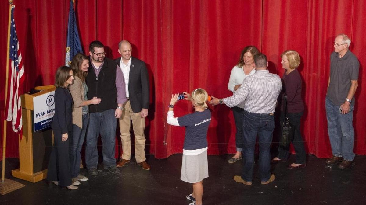 Evan McMullin supporters line up for photos following the independent presidential candidate’s speech Saturday in Boise.