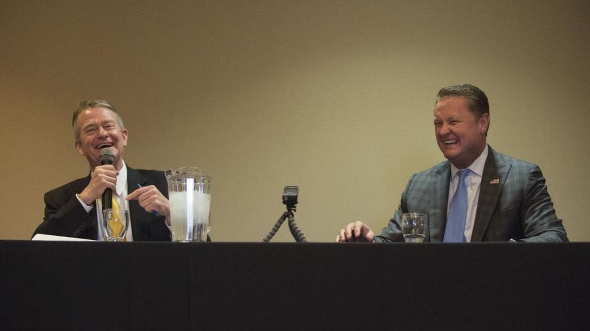 Lt. Gov. Brad Little, left, and Boise businessman Tommy Ahlquist, both Republican candidates for governor, share a laugh during a candidate forum Monday, presented by the Twin Falls City Club.