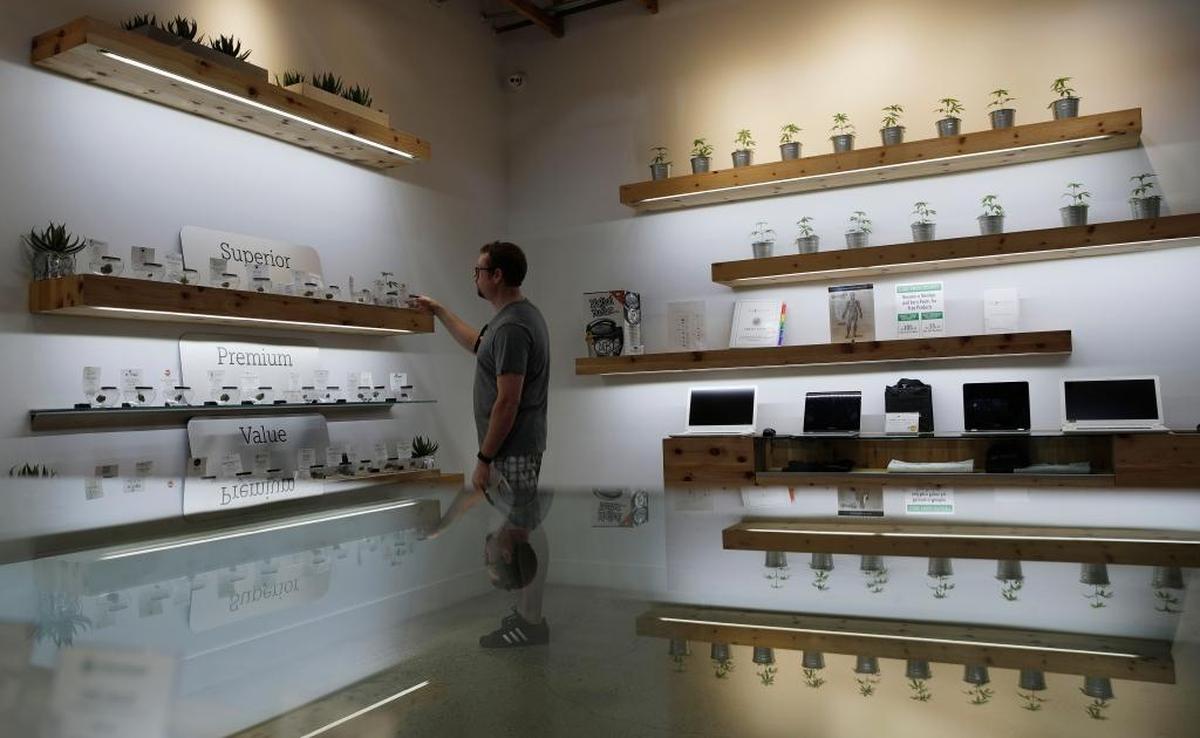A man shops for marijuana at The Source dispensary in Las Vegas on July 1, 2017.