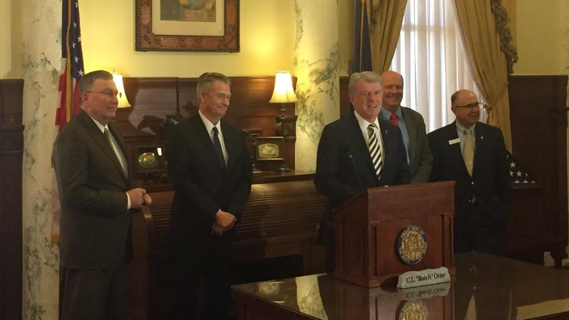 Gov. Butch Otter speaks to the media at his final post-Legislature press conference. Otter is not running for a fourth term this year. With him, from left: House Speaker Scott Bedke, Lt. Gov. Brad Little, House Majority Leader Mike Moyle, Senate Majority Leader Chuck Winder.