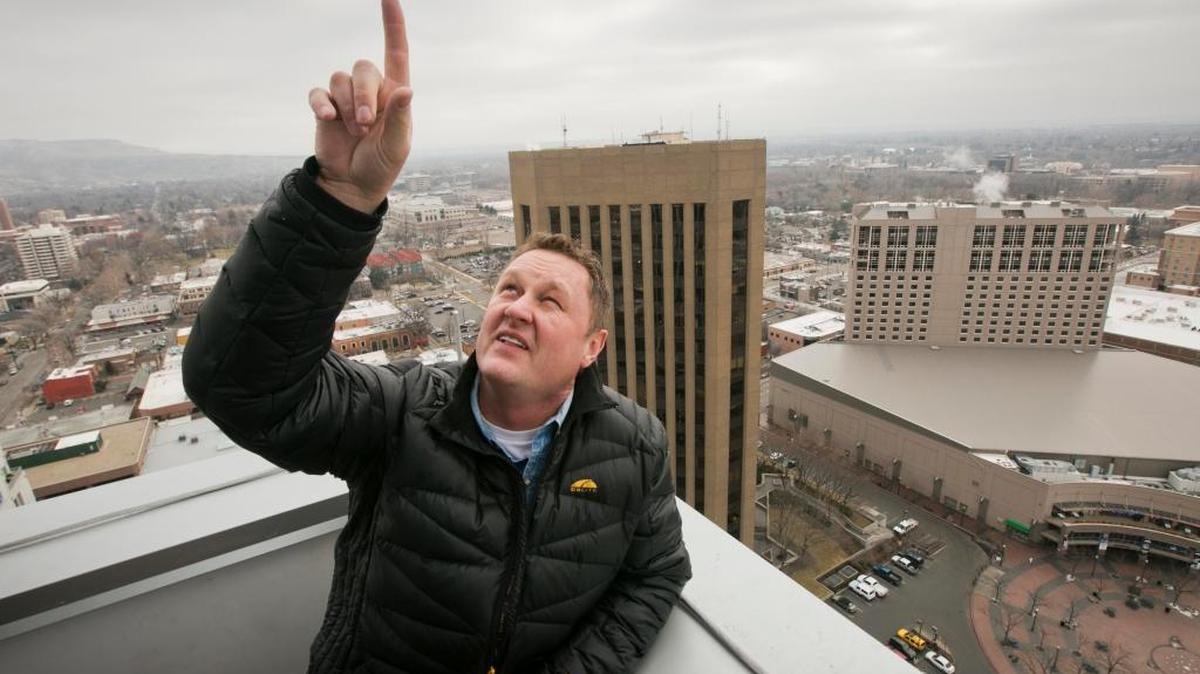 Gardner Co. chief Tommy Ahlquist, shown here leading a tour of the Eighth & Main building in 2014, is the organizing force behind the new policy group, Idaho 2020.