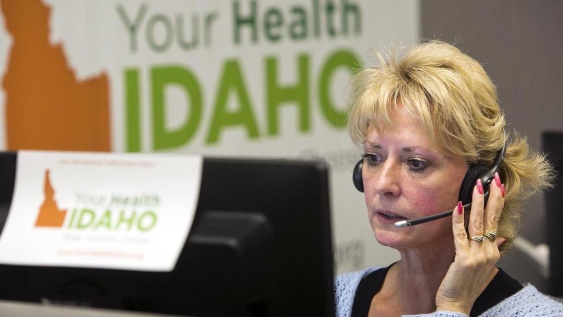 Heidi Zimmers, a customer service representative at Your Health Idaho’s call center in Boise, answers questions and helps a caller navigate the first day of the health care insurance exchange Tuesday, Oct. 1, 2013.