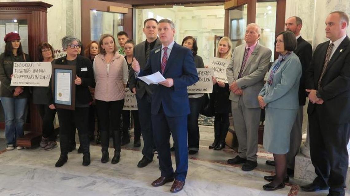 Rep. Brent Crane, R-Nampa, joins advocates against human trafficking and a handful of other lawmakers at a Statehouse news conference to announce planned legislation.