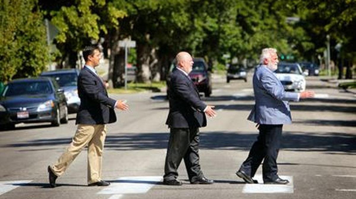District 16 Democratic delegation, left to right, Rep. John McCrostie, Sen. Grant Burgoyne and Rep. Hy Kloc doing the Beatles’ Abbey Road walk Boise-style.