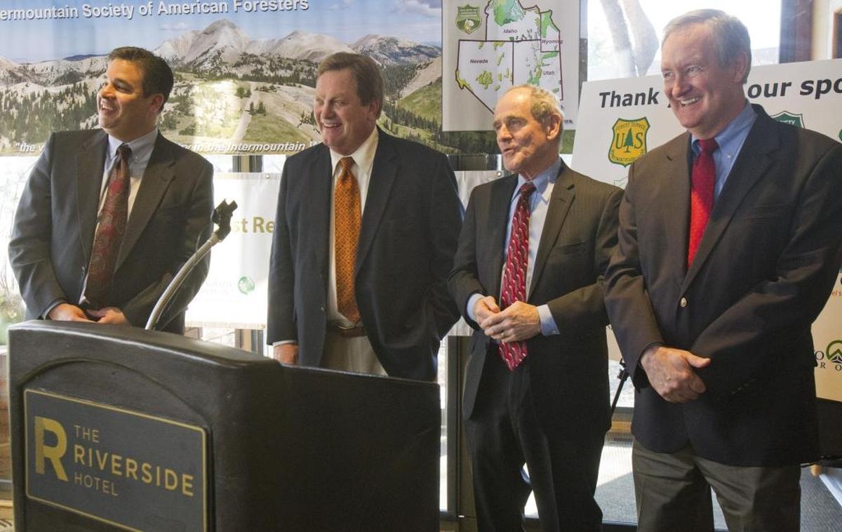 From left, U.S. Reps. Raul Labrador and Mike Simpson, and Sens. Jim Risch and Mike Crapo, joke during a February 2014 press conference at The Riverside Hotel in Garden City.