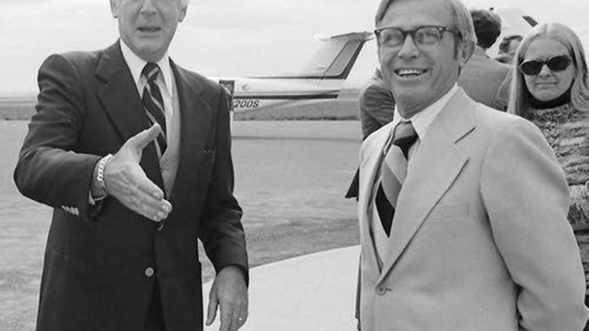 Mike Mitchell (right) greeted his old boss, Secretary of the Interior Cecil Andrus, at the Lewiston airport in 1977.