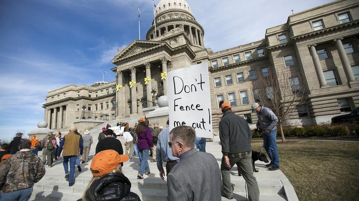 Jim Jeffress, from Meridian, holds a sign while walking with a large group to the Idaho State Capitol before a rally for public lands. “I am a first-time sign carrier,” Jeffress said. “This is an important issue of freedom and liberty for people who enjoy the outdoors.”